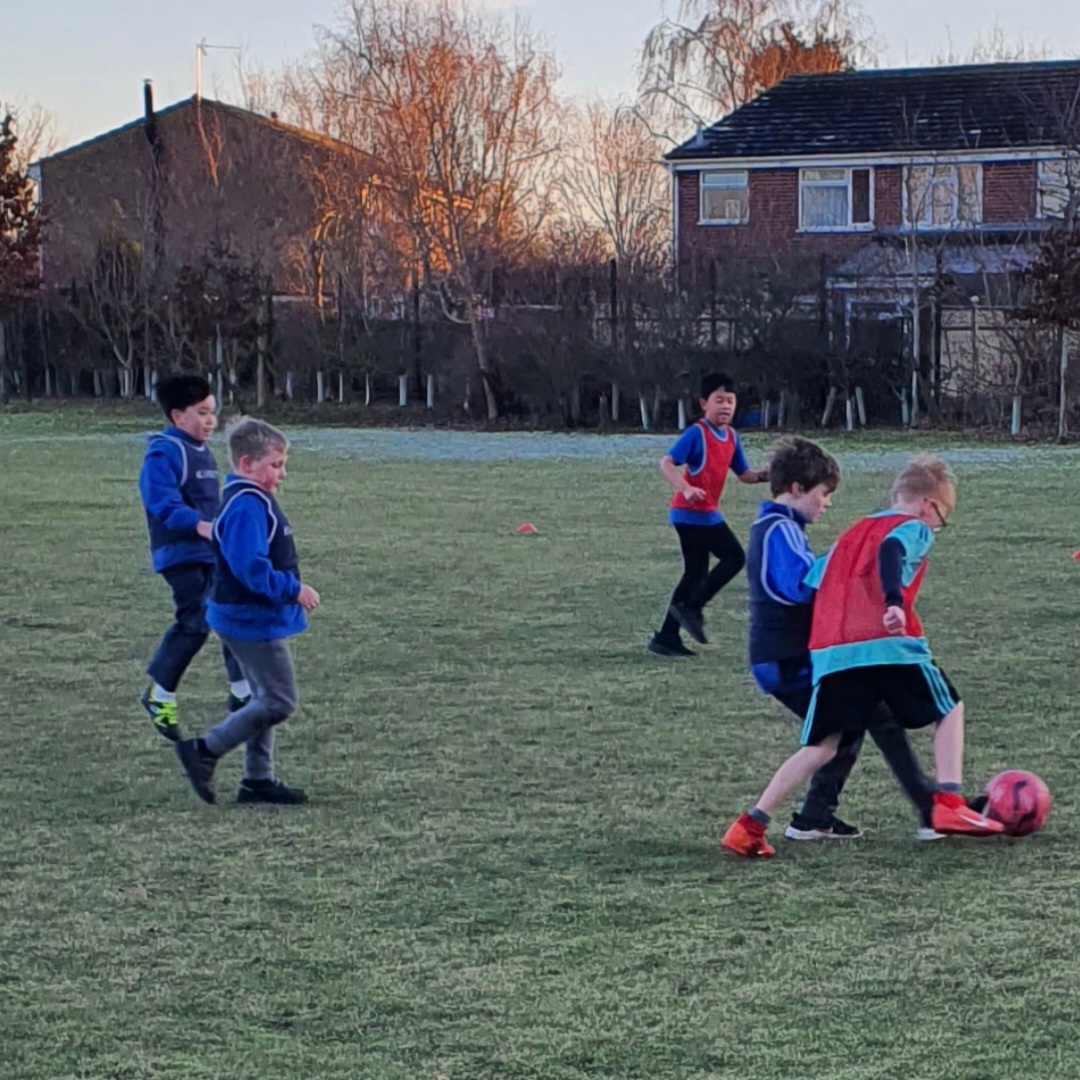 Kids playing football